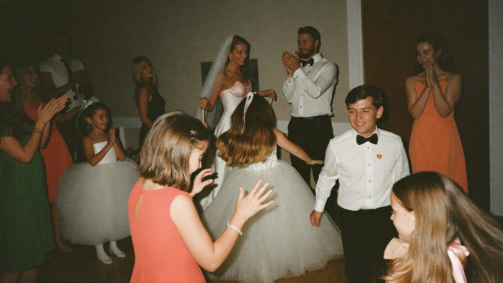 Children dancing with the bride on the dance floor