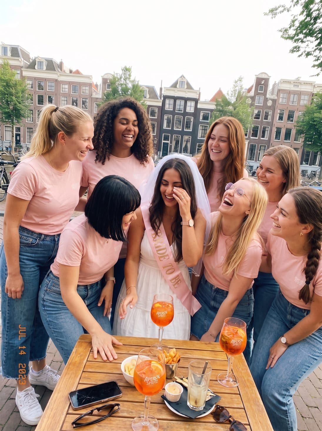The whole group laughing on the terrace