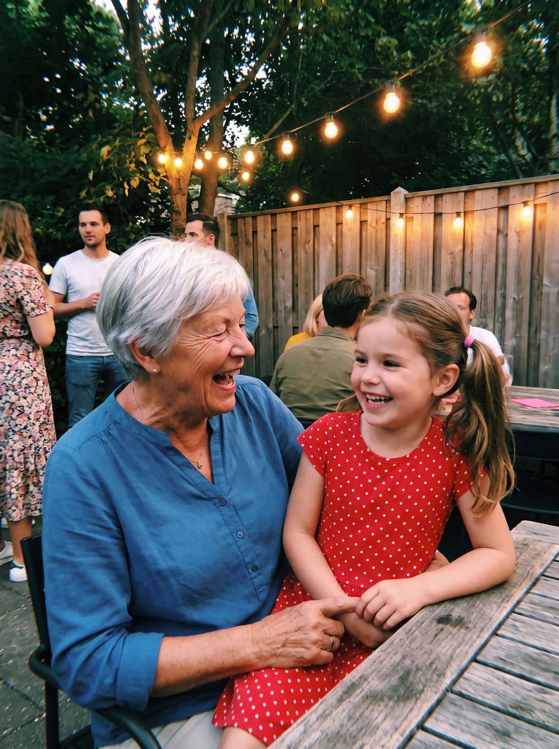 Grandma and granddaughter laughing