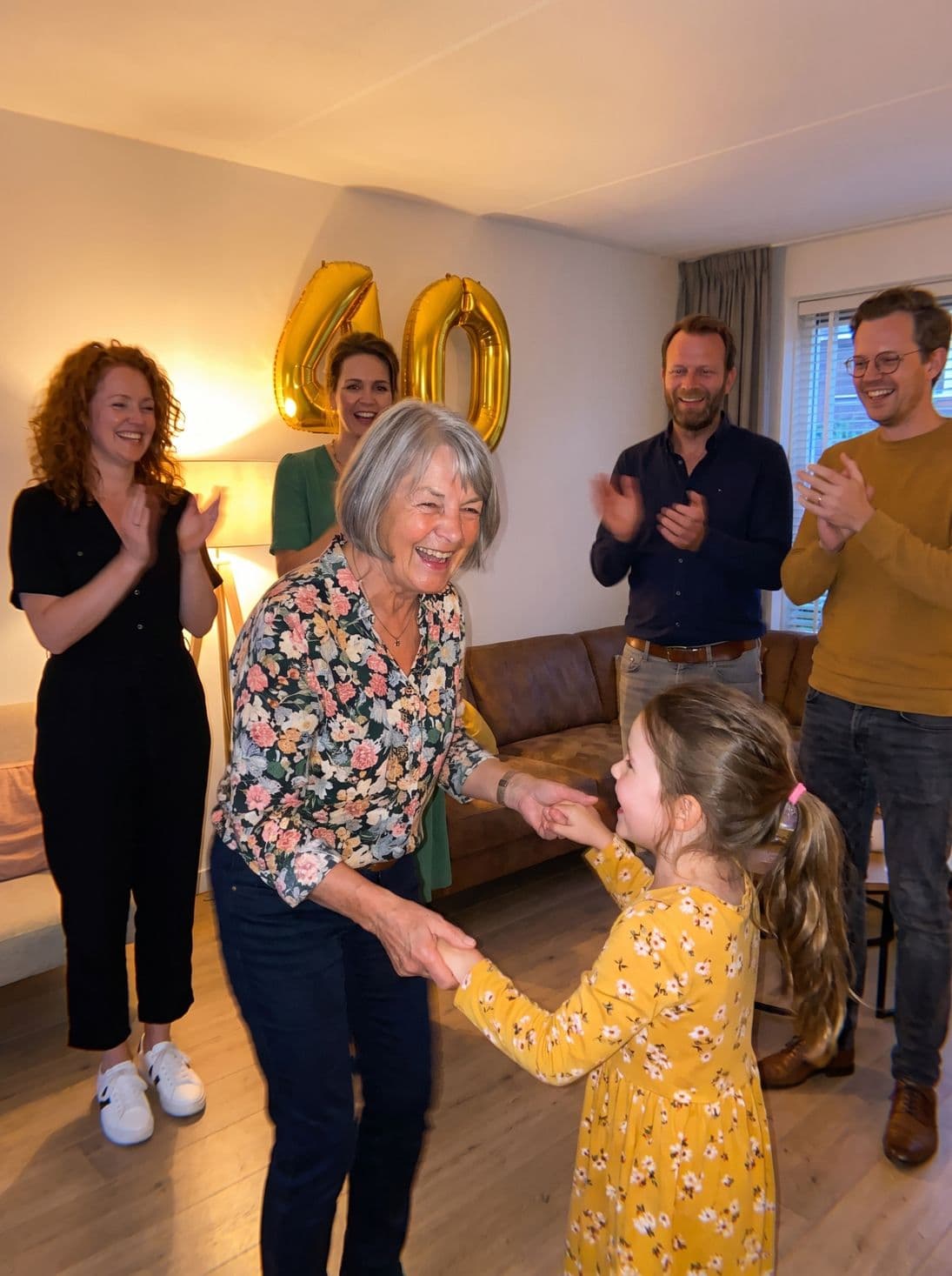 Grandma dances with her granddaughter