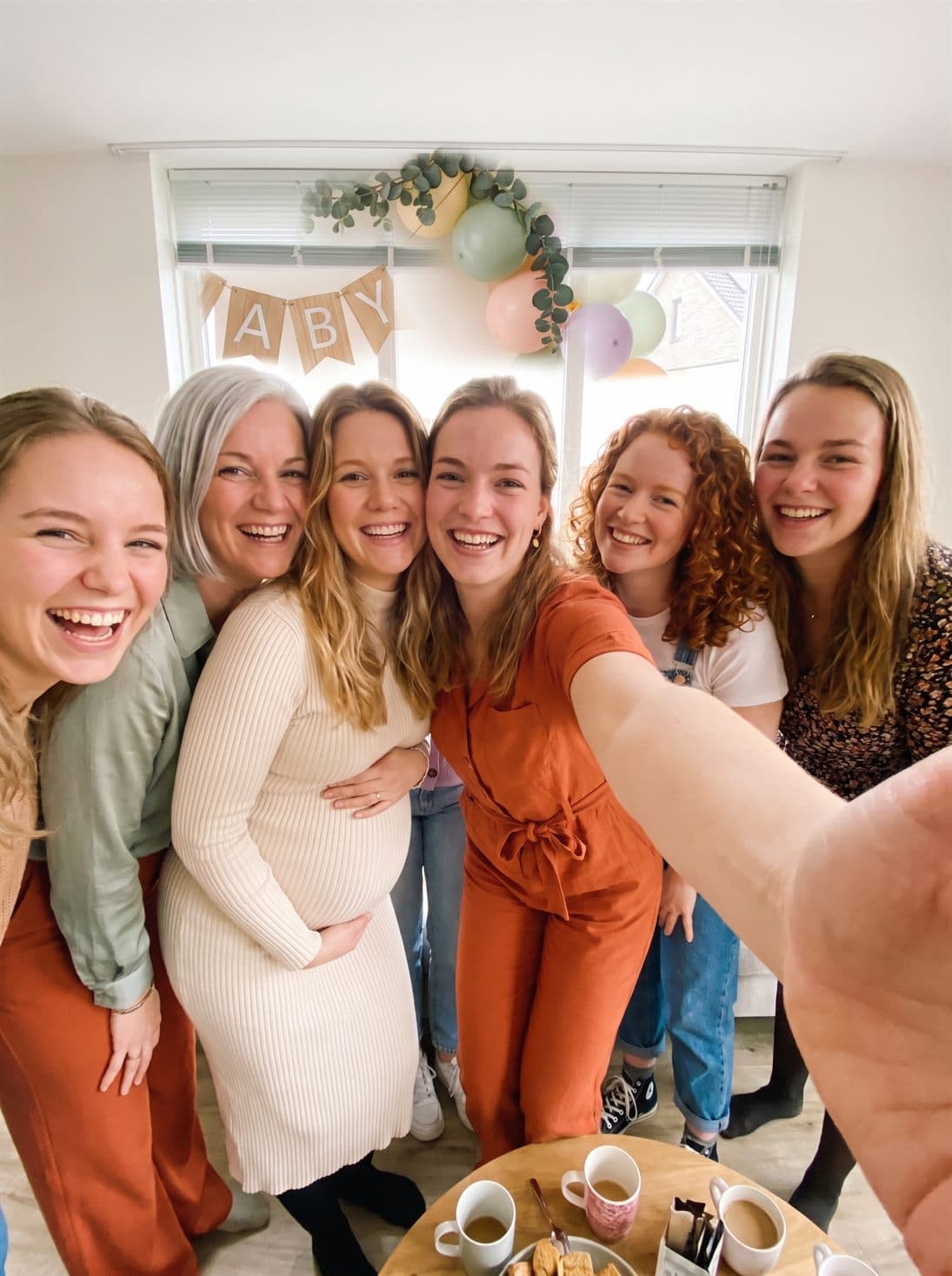 Group selfie at the baby shower