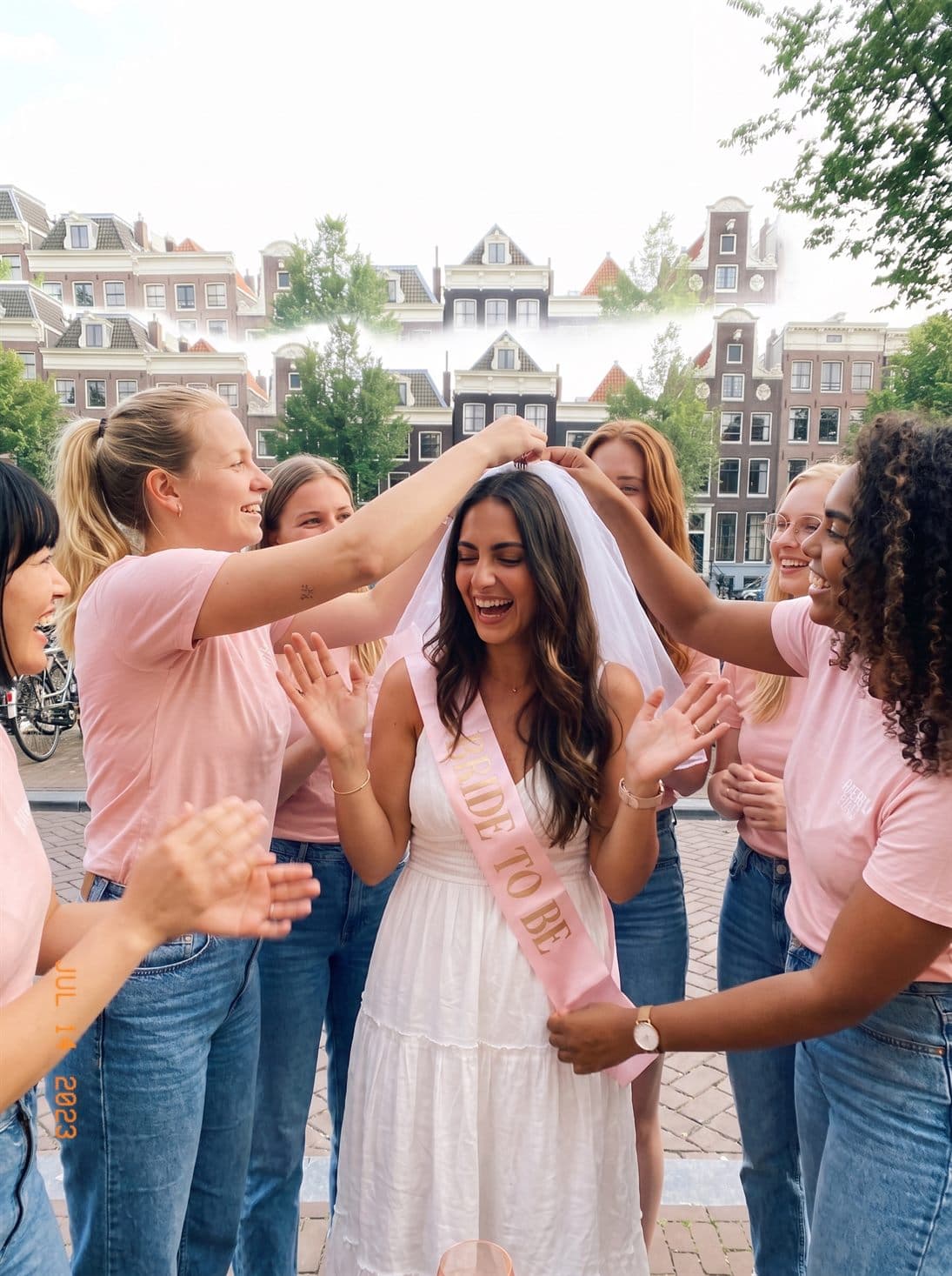 Kim gets the sash and the little veil at the meeting point