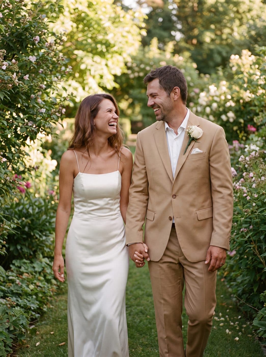 The couple walking hand in hand