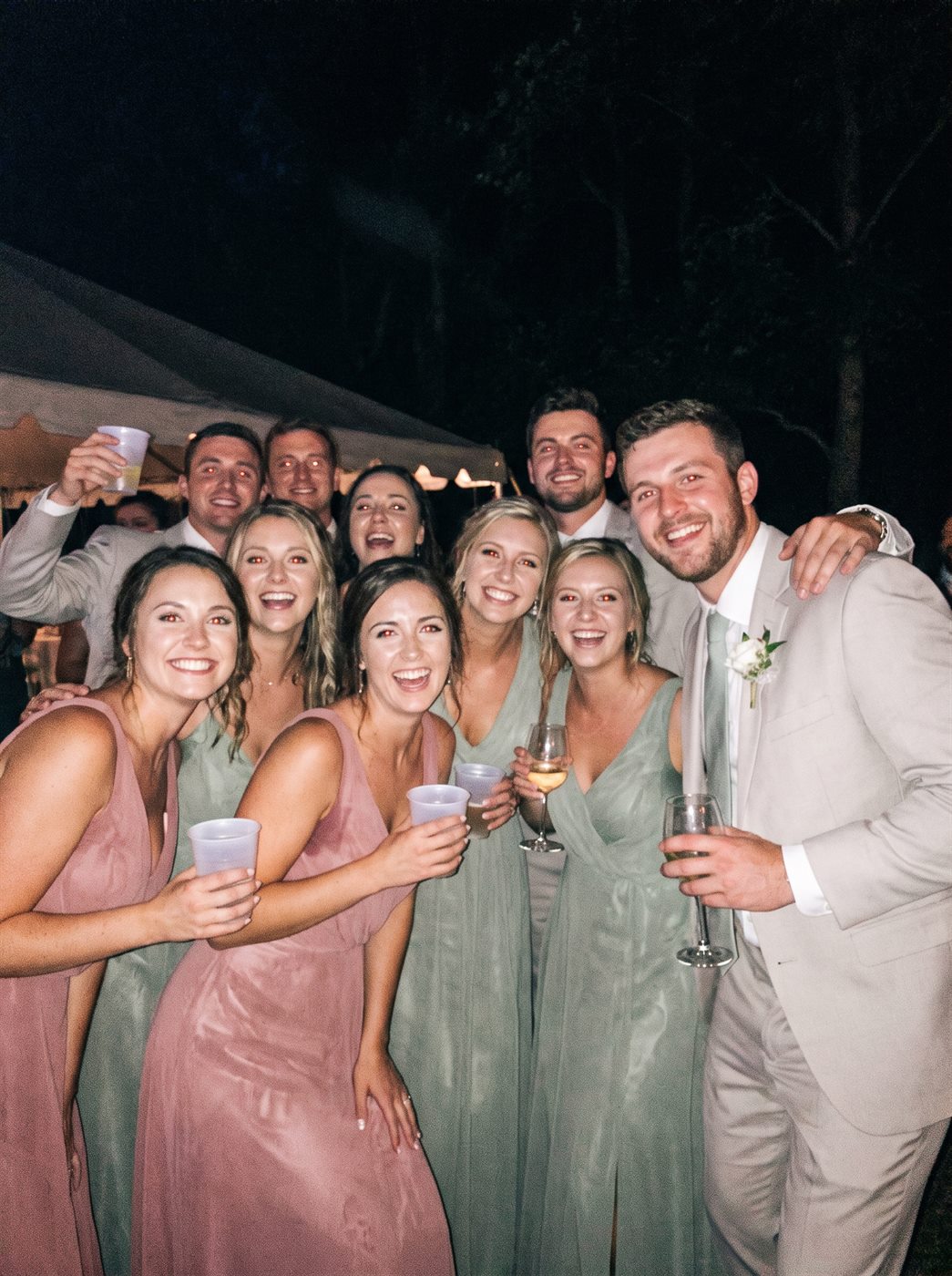 Guests with drinks at the party
